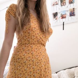 yellow floral dress with rouching on shoulders